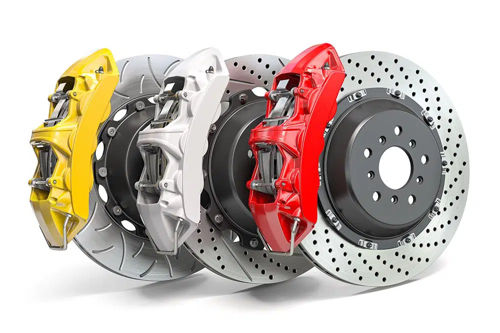 Braking system. Car brake disks with different perforations and