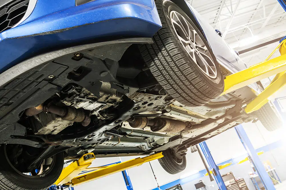 Modern Car Under Maintenance Inside Auto Service